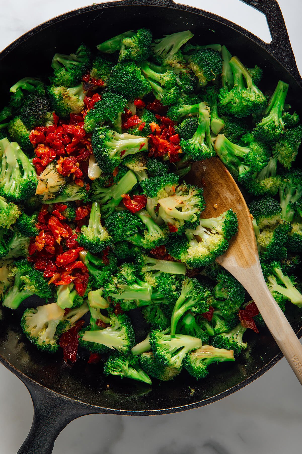 cooking sun-dried tomatoes with broccoli