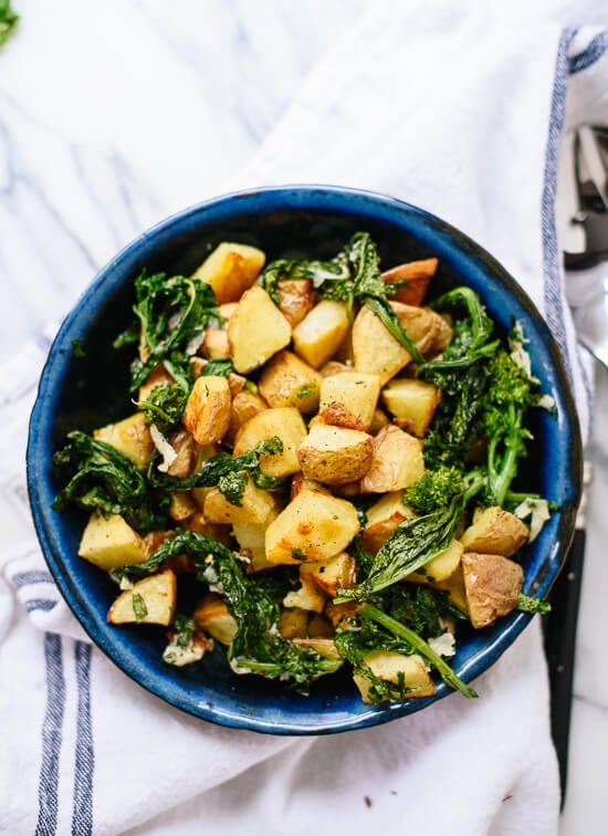 Roasted broccoli rabe and potatoes with a zippy dressing make a great side dish (or breakfast hash!) - cookieandkate.com