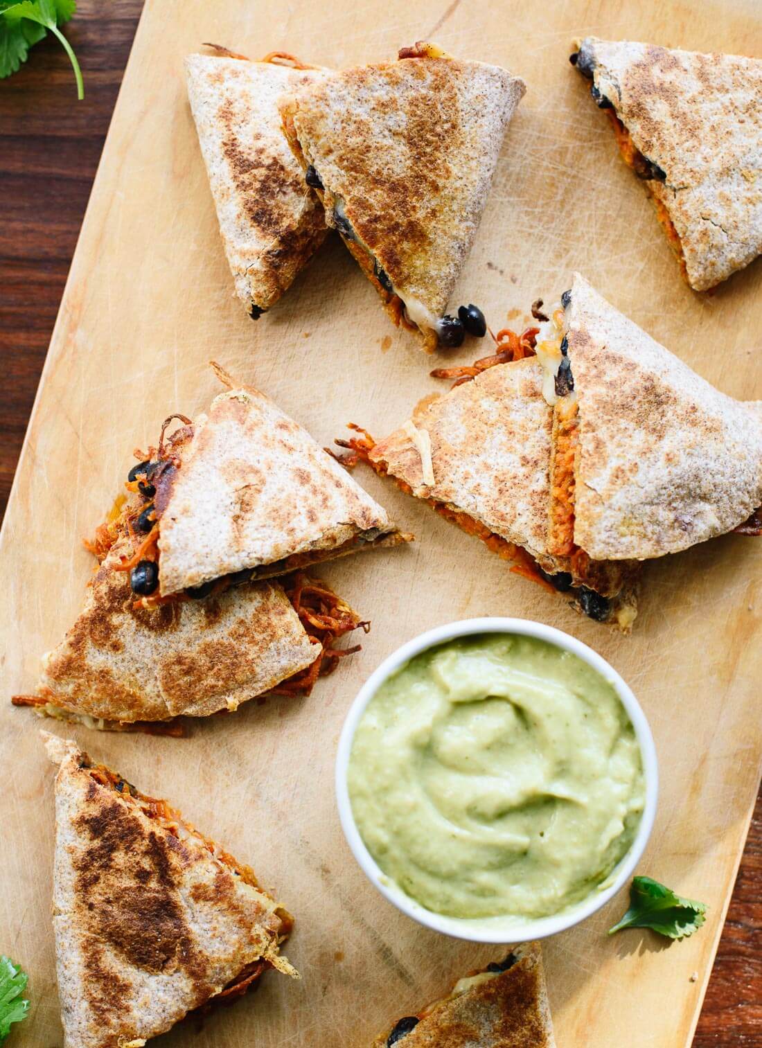 Amazing sweet potato black bean quesadillas with creamy avocado salsa verde (perfect for busy weeknights!) - cookieandkate.com