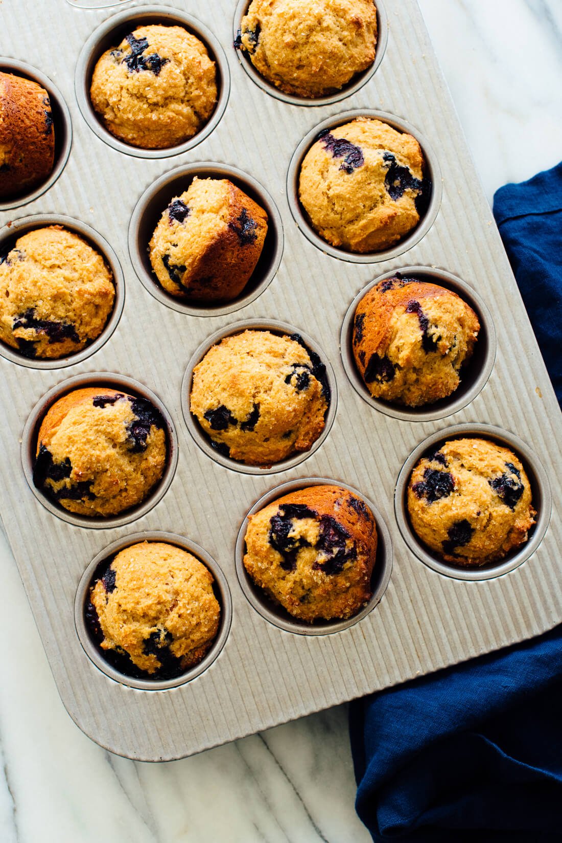 healthy blueberry muffins in muffin tin